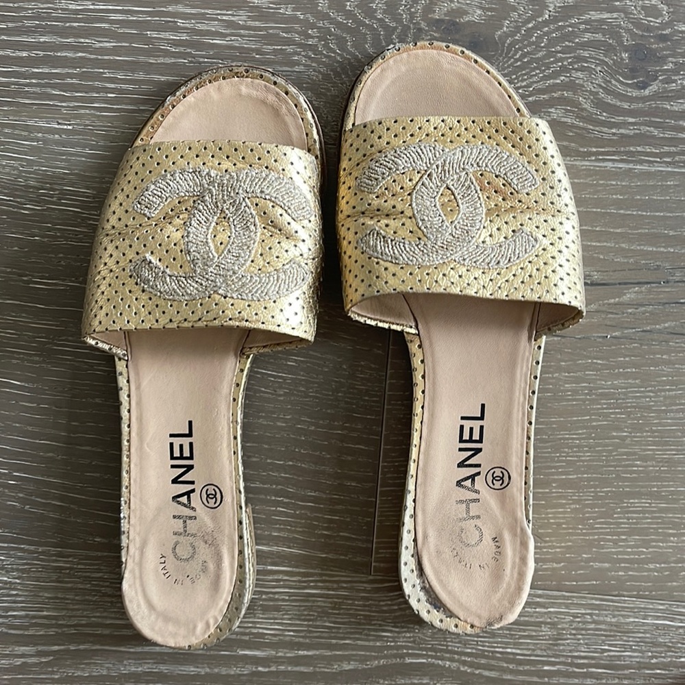 Gold Chanel slides